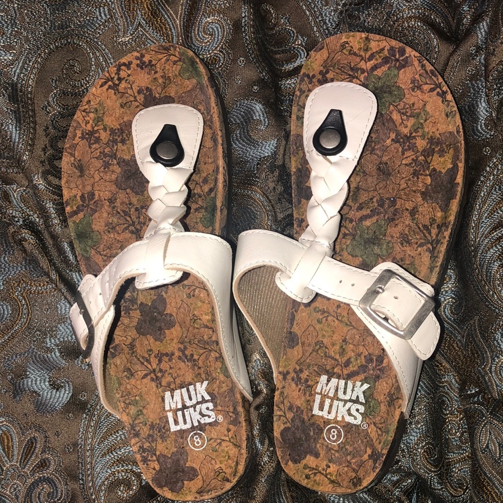 Like new sandals so cute on. Little big for me